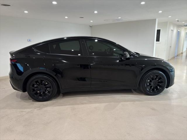 used 2021 Tesla Model Y car, priced at $27,999