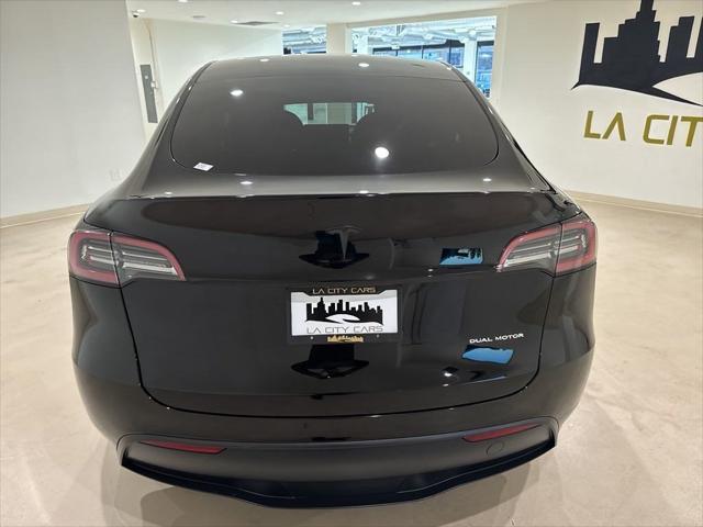 used 2021 Tesla Model Y car, priced at $27,999