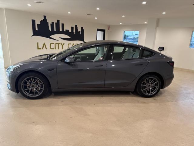 used 2022 Tesla Model 3 car, priced at $26,599