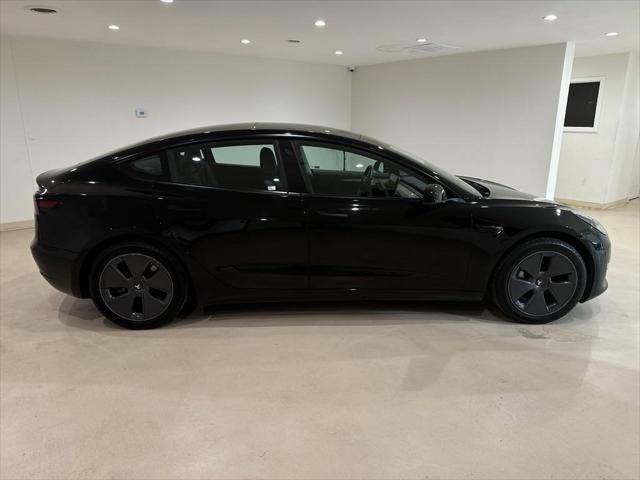 used 2022 Tesla Model 3 car, priced at $22,999