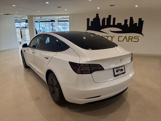 used 2023 Tesla Model 3 car, priced at $25,999