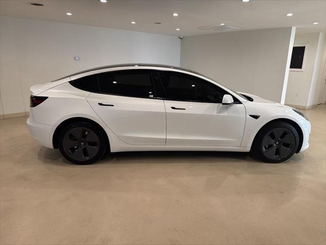 used 2023 Tesla Model 3 car, priced at $25,999