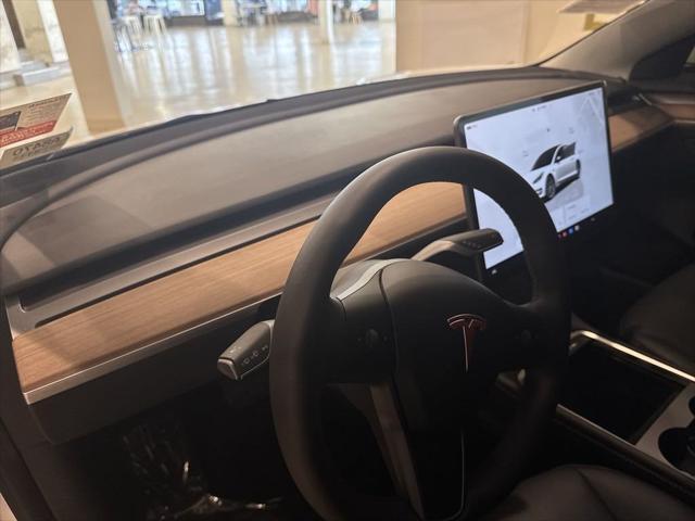 used 2023 Tesla Model 3 car, priced at $25,999