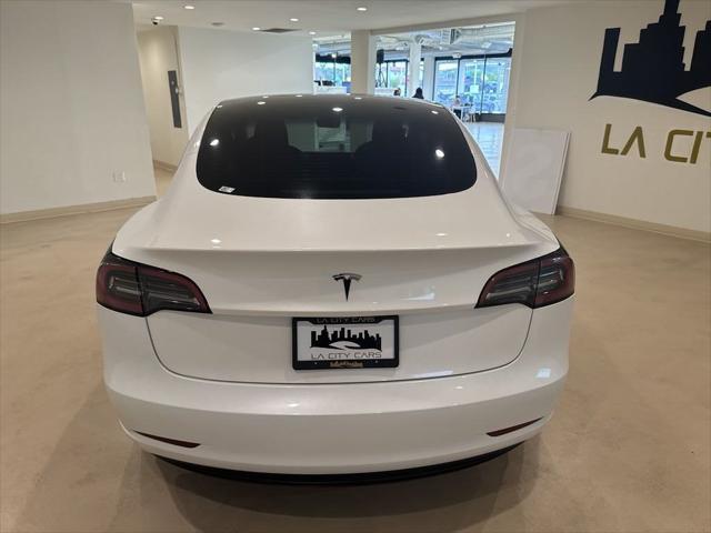 used 2023 Tesla Model 3 car, priced at $25,999