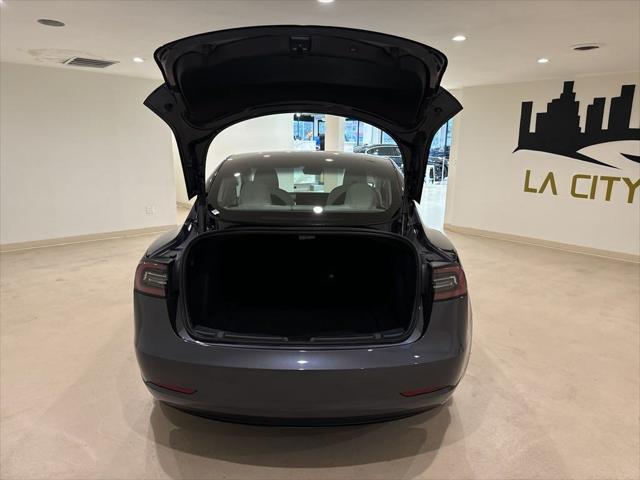 used 2023 Tesla Model 3 car, priced at $26,649