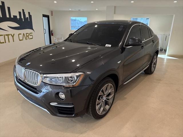 used 2017 BMW X4 car, priced at $17,999