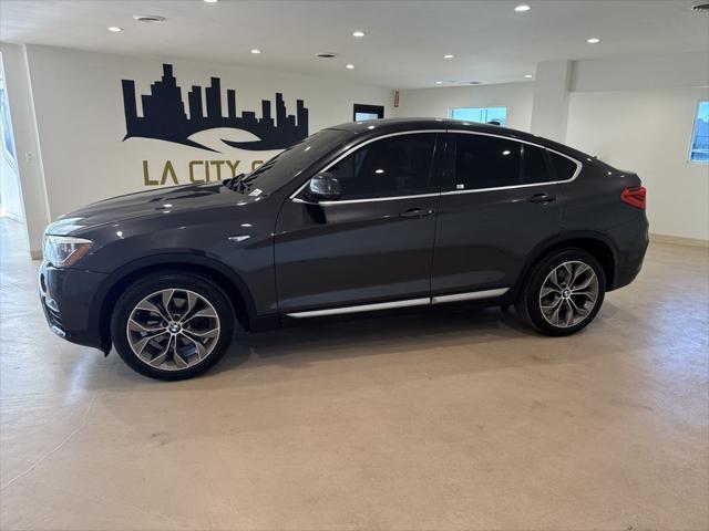 used 2017 BMW X4 car, priced at $17,999