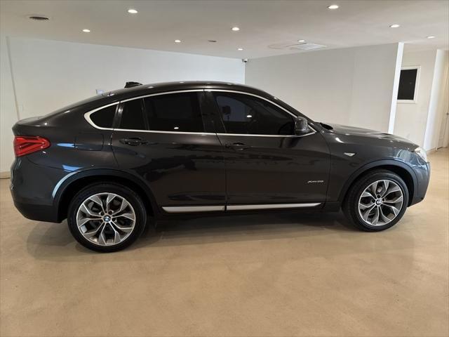 used 2017 BMW X4 car, priced at $17,999