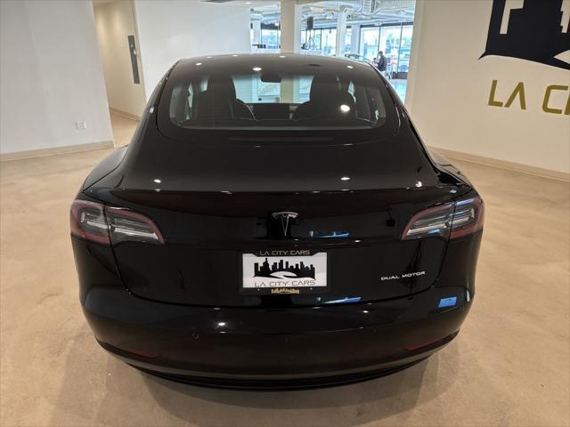 used 2022 Tesla Model 3 car, priced at $25,999