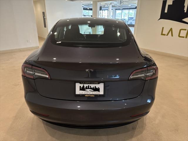 used 2023 Tesla Model 3 car, priced at $25,999