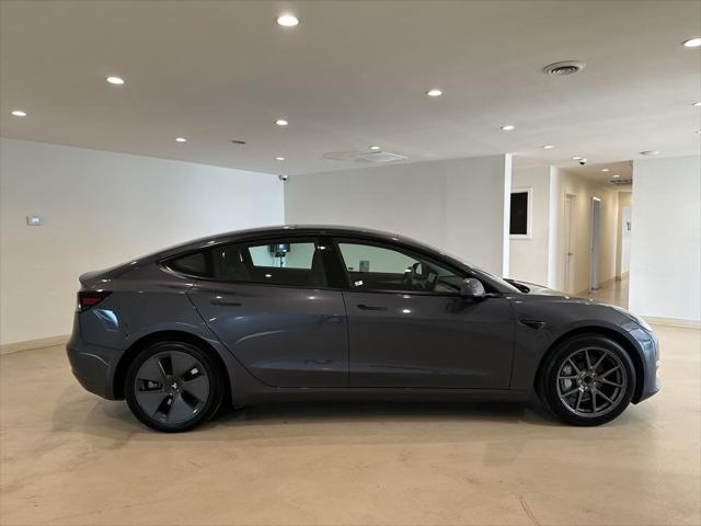 used 2023 Tesla Model 3 car, priced at $27,599