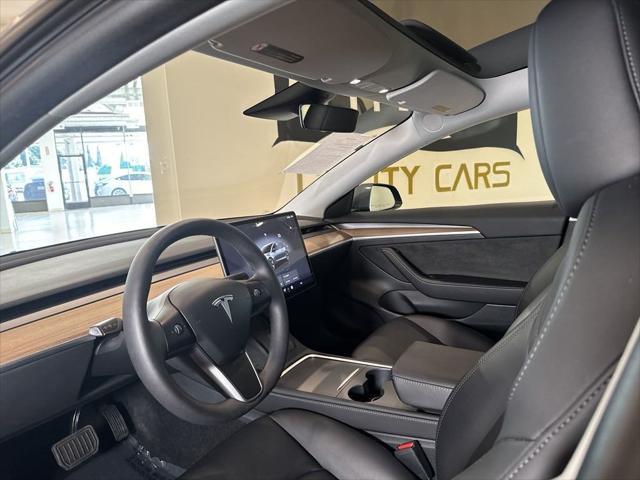 used 2023 Tesla Model 3 car, priced at $27,599