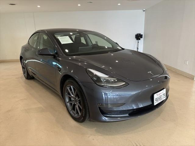 used 2023 Tesla Model 3 car, priced at $27,599