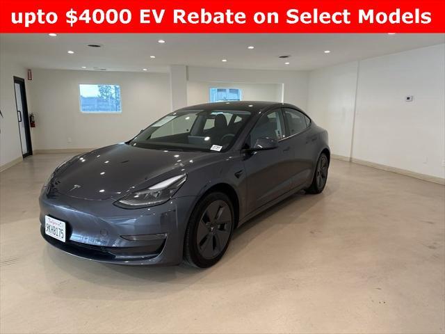 used 2023 Tesla Model 3 car, priced at $27,599