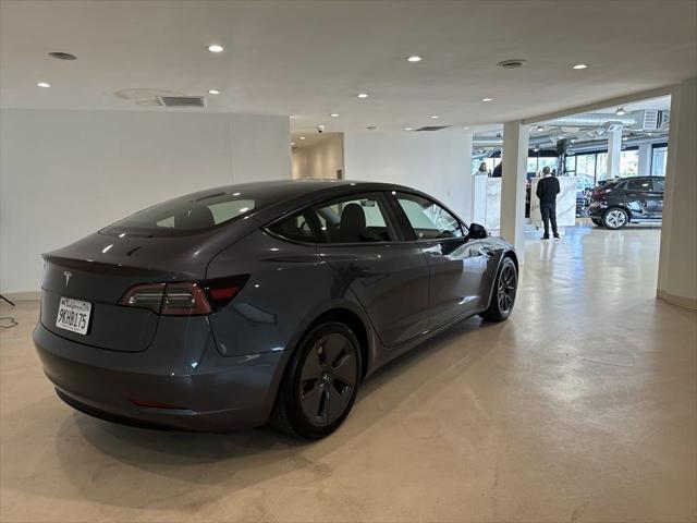 used 2023 Tesla Model 3 car, priced at $27,599