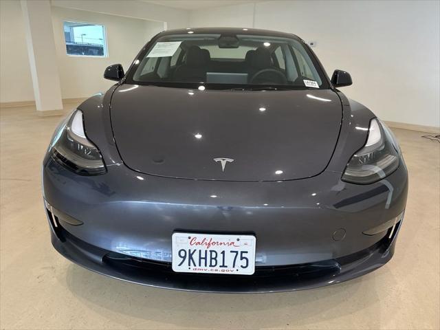 used 2023 Tesla Model 3 car, priced at $27,599