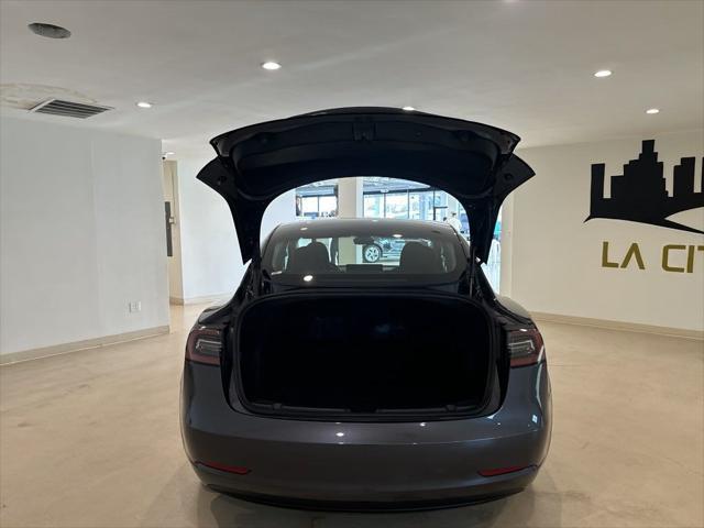 used 2023 Tesla Model 3 car, priced at $27,599