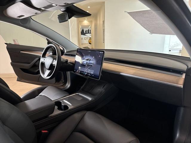 used 2023 Tesla Model 3 car, priced at $27,599