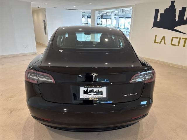 used 2022 Tesla Model 3 car, priced at $26,999