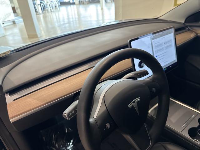 used 2022 Tesla Model 3 car, priced at $26,999