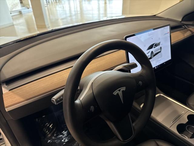 used 2022 Tesla Model 3 car, priced at $24,899