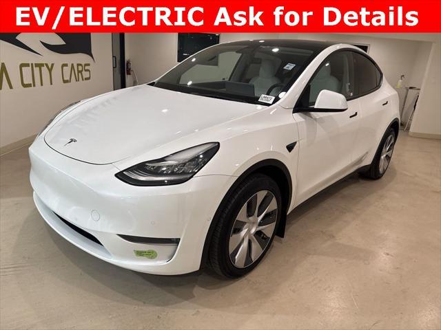 used 2021 Tesla Model Y car, priced at $27,999