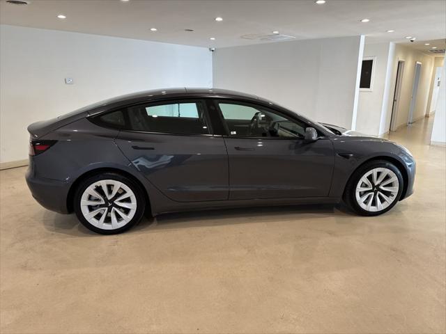 used 2023 Tesla Model 3 car, priced at $25,999