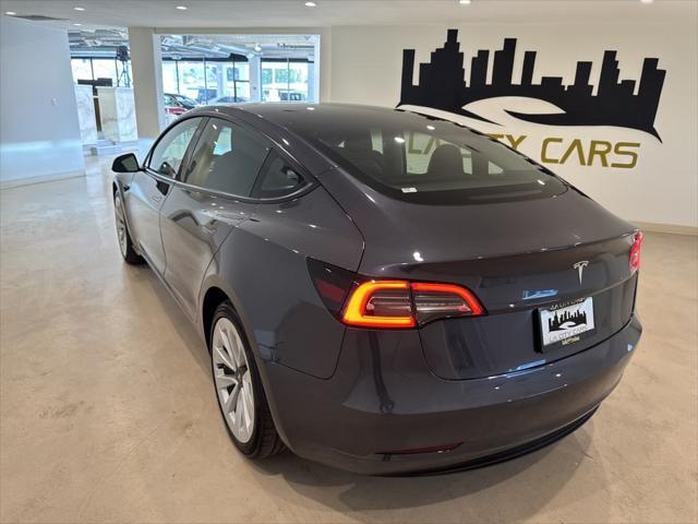 used 2023 Tesla Model 3 car, priced at $25,999