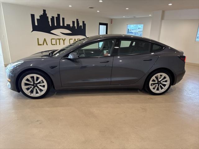 used 2023 Tesla Model 3 car, priced at $25,999