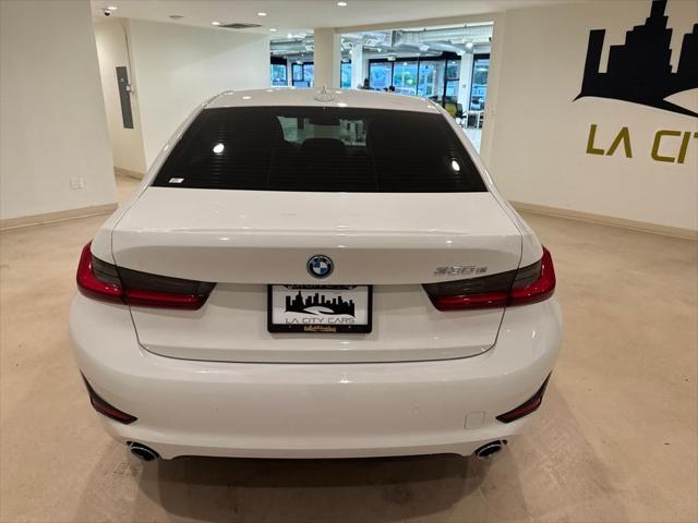 used 2022 BMW 330e car, priced at $27,299