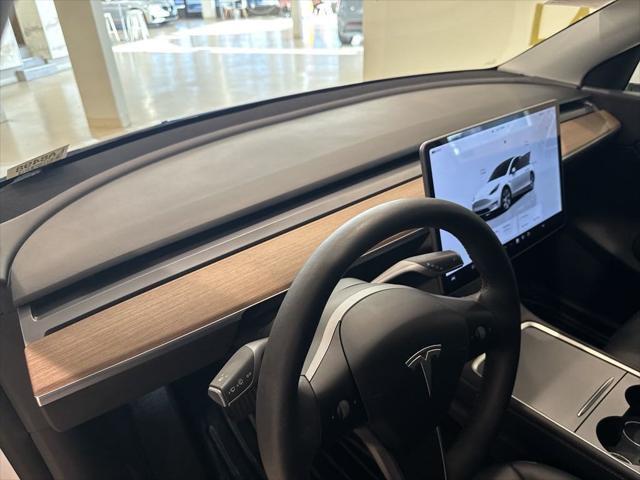 used 2022 Tesla Model Y car, priced at $28,299