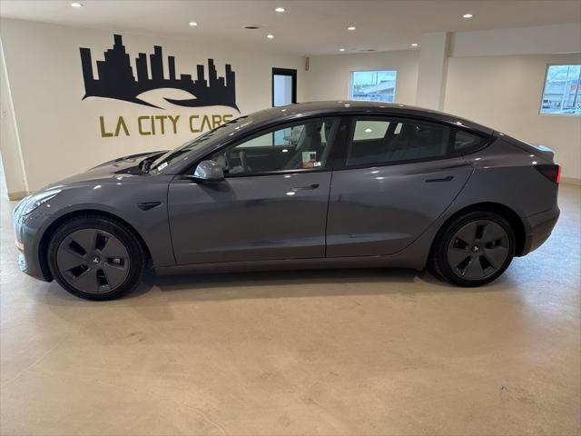 used 2022 Tesla Model 3 car, priced at $24,699