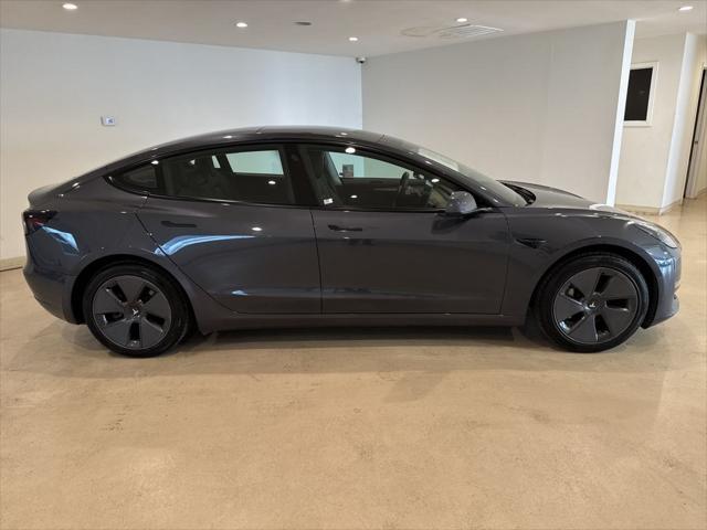 used 2022 Tesla Model 3 car, priced at $24,699