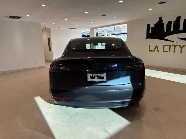 used 2020 Tesla Model 3 car, priced at $15,999