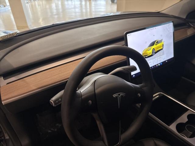 used 2023 Tesla Model 3 car, priced at $25,999