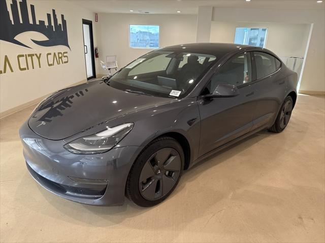 used 2023 Tesla Model 3 car, priced at $25,999