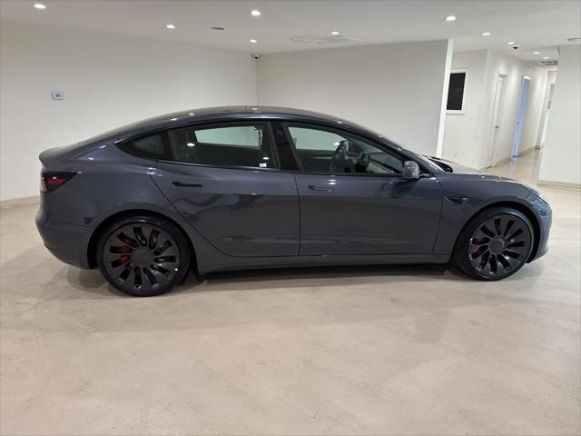 used 2022 Tesla Model 3 car, priced at $28,999