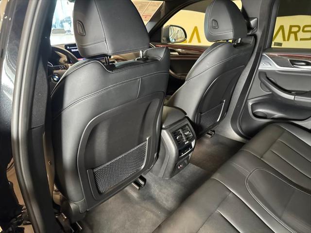 used 2024 BMW X4 car, priced at $39,799