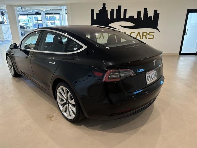 used 2018 Tesla Model 3 car, priced at $23,499