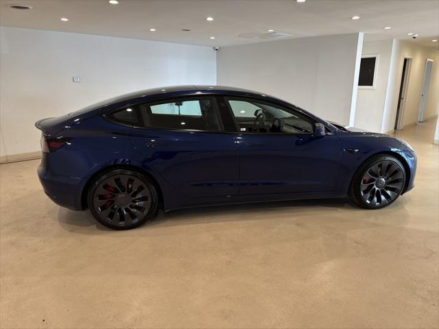 used 2022 Tesla Model 3 car, priced at $26,999