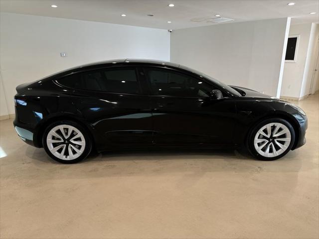 used 2022 Tesla Model 3 car, priced at $26,999