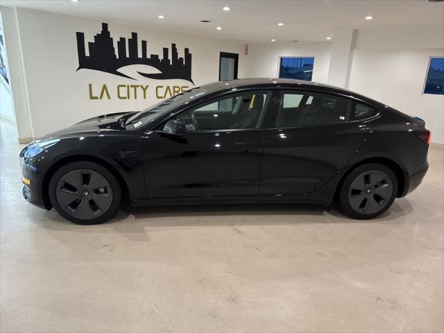 used 2022 Tesla Model 3 car, priced at $26,999