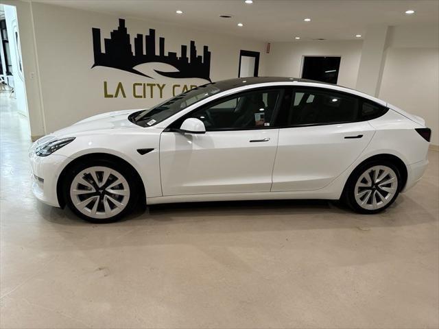 used 2022 Tesla Model 3 car, priced at $25,999