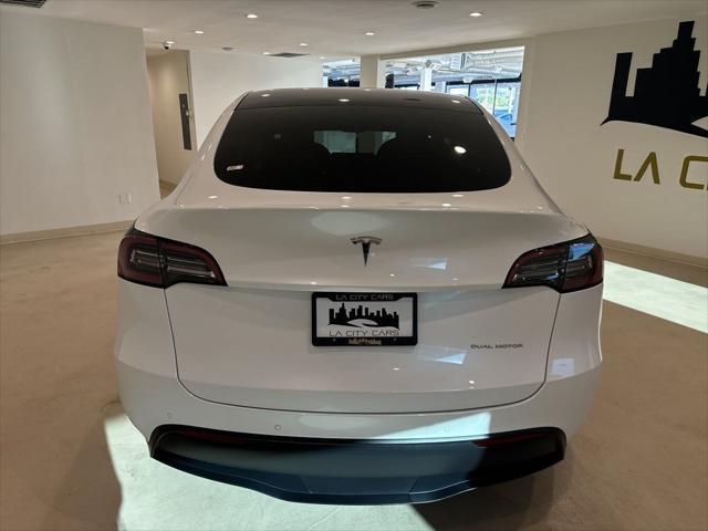 used 2021 Tesla Model Y car, priced at $27,399