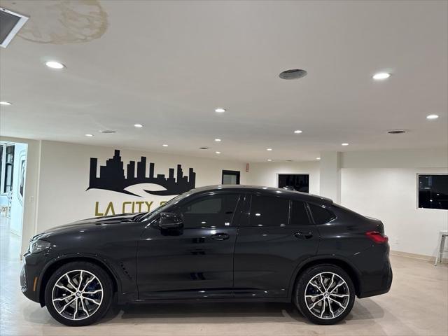 used 2022 BMW X4 car, priced at $39,999