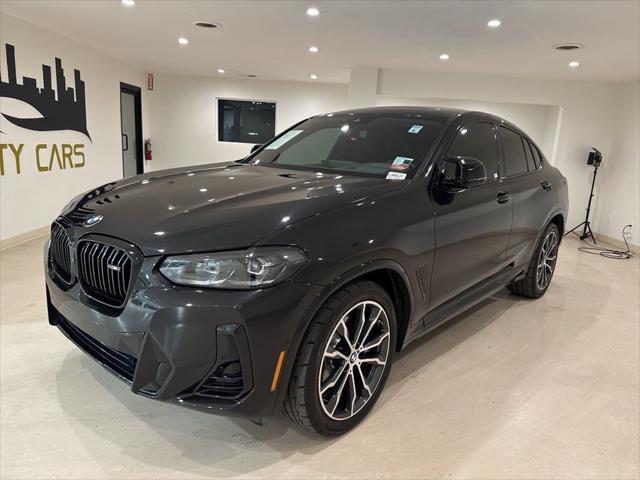 used 2022 BMW X4 car, priced at $39,999