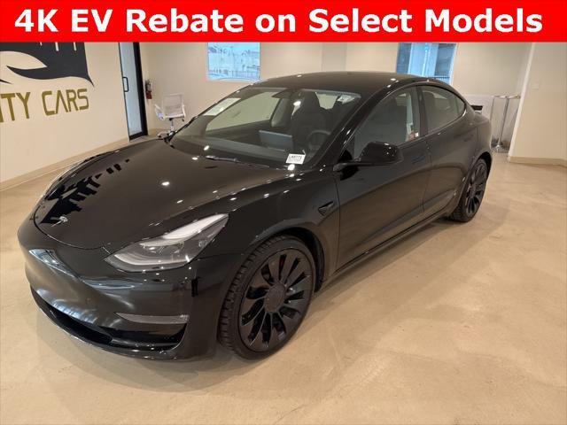 used 2023 Tesla Model 3 car, priced at $28,699