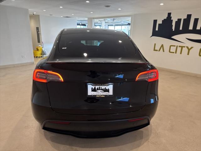 used 2022 Tesla Model Y car, priced at $27,999