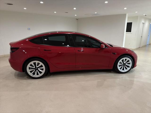 used 2022 Tesla Model 3 car, priced at $26,999