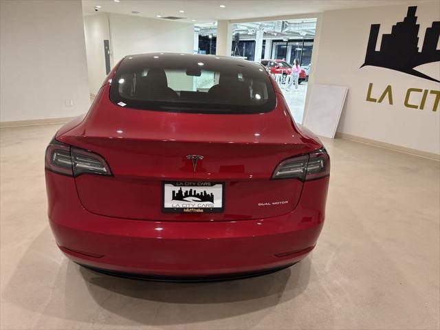 used 2022 Tesla Model 3 car, priced at $26,999